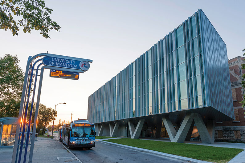 A bus stopped outside of the University of Manitoba