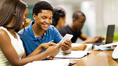 Students reading together in a classroom