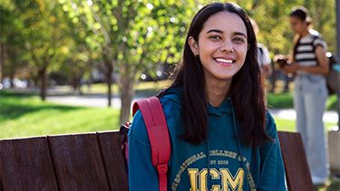 Female student wearing an ICM hoodie